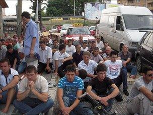 Muslims worship on the streets of Pristina outside a full mosque