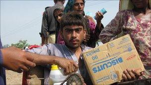 People receive aid in Sukkur
