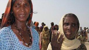 Two women refused aid at a camp in Sukkur