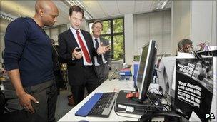 Nick Clegg on a visit to the DEC headquarters