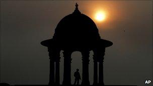 Raisina Hill, which houses important government buildings, as the sun sets in the horizon, in New Delhi, India