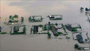 Image released on 21 August by North Korean news agency KCNA shows flooding in Sinuiju area