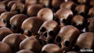 The skulls of Rwandan victims rest on shelves at a genocide memorial inside the church at Ntarama just outside the capital Kigali