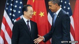 US President Barack Obama greets Chinese Premier Wen Jiabao