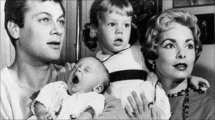 Tony Curtis and Janet Leigh with daughters Kelly and Jamie Lee
