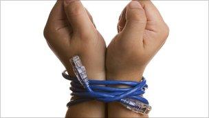 Hands bound by ethernet cable (Thinkstock)