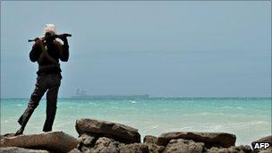 Pirate on the coast in Hobyo, central Somalia (20 Aug 2010)