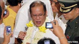 President Aquino arrives to give a speech in Manila 7 Oct 2010