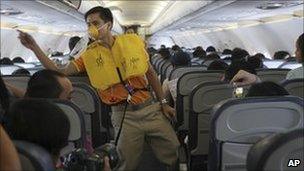 Male air crew dancing on Cebu pacific plane 8 oct 2010