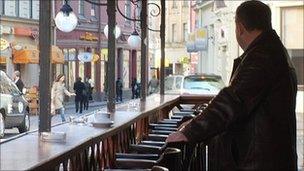 Man alone in a bar