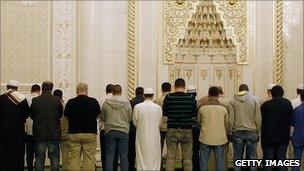 Muslims attend a mosque in Germany