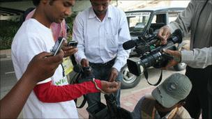 Wolf snake being filmed by Indian media