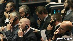 Traders at the London Metal Exchange