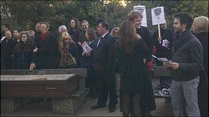 Protesters with a coffin in Reading