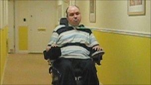 Jamie Merrett in his wheelchair