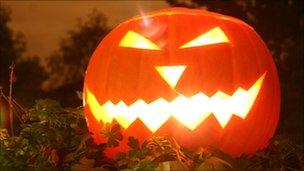 A pumpkin carved for Halloween to form a Jack-o-lantern