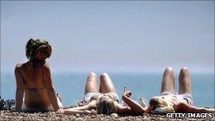 sunbathers on beach