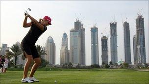 Anna Nordqvist tees off at the Dubai Ladies Masters, with the marina skyline in the background