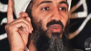 Osama Bin Laden speaking at an undisclosed location in Afghanistan, in an undated photo