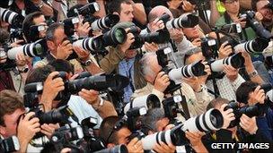 Photographers at a film event