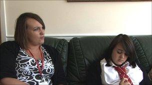 Hannah Dudley and Loretta share the family sofa
