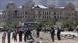 Kabul police at scene of bomb blast near palace destroyed during civil war in 1990s (file photo: May 2010)