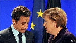 French President Nicolas Sarkozy with German Chancellor Angela Merkel in Deauville, 19 Oct 10