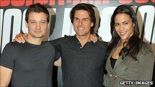 Cruise (centre) with co-stars Jeremy Renner and Paula Patton