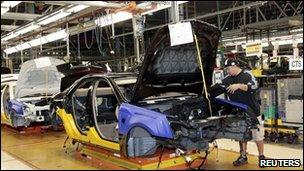 Worker on assembly line for GM Cadillac