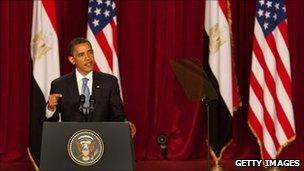 Barack Obama addresses a packed audience at Cairo University (June 2009)