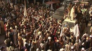A militant leader addresses a crowd in Muzaffarabad