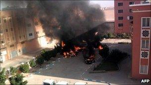 Cars on fire in Laayoune after clashes (image released by Sahrawi Resistance Movement 8 Nov 2010)