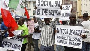 Trade union members display placards during a protest, in Lagos, Nigeria, Wednesday 10 November 2010