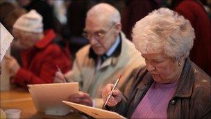 Senior citizens take part in a water colour painting session at The Retirement Show at Manchester Central on March 19, 2010 in Manchester, United Kingdom.
