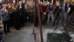 Professor Jens Vellev speaking as the tombstone of Danish astronomer Tycho Brahe is about to be lifted at the Church of Our Lady Before Tyn, Prague 15 November 2010