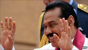 Mr Rajapaksa greets supporters at the swearing-in ceremony