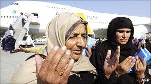 Pakistani Muslims ready to depart from Lahore airport for the annual Hajj in Saudi Arabia