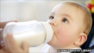 File photo of nine-month-old boy drinking from a bottle