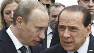 Vladimir Putin (left) and Silvio Berlusconi