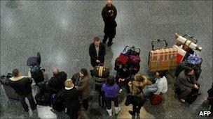Passengers waiting at Gatwick Airport