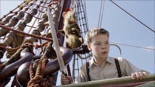 Eustace (Will Poulter) on the Dawn Treader with Reepicheep the swashbuckling mouse (voiced by Simon Pegg)