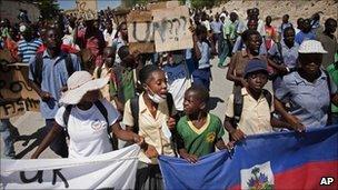 Protesters march towards the UN base in Mirebalais, Haiti, where Nepalese peacekeepers live (29 October 2010)