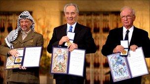 Yasser Arafat, Shimon Peres, Yitzhak Rabin with their Nobel Prize for peace, Oslo, Dec 1994