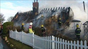 The thatched cottages caught fire (Pic: Essex County Fire and Rescue Service)