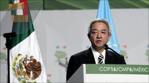 Japan's Environment Minister Ryu Matsumoto gives a speech during a plenary session at the Moon Palace, where climate talks are taking place, in Cancun December 9, 2010.