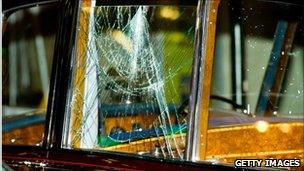 Window of royal car smashed by protesters