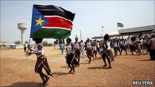 Southern Sudanese rally behind their flag in support of independence