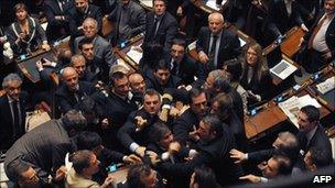 Members of the Northern League and Futura e Liberta (FLI) clash in the Italian lower house (14 Dec 2010)