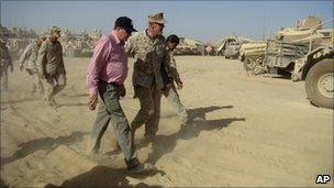 Richard Holbrooke listens to US Maj Gen Richard Mills during a visit to Marjah, south of Kabul, Afghanistan in June 2010