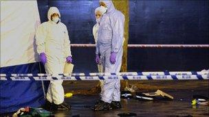 Forensic officers at the scene